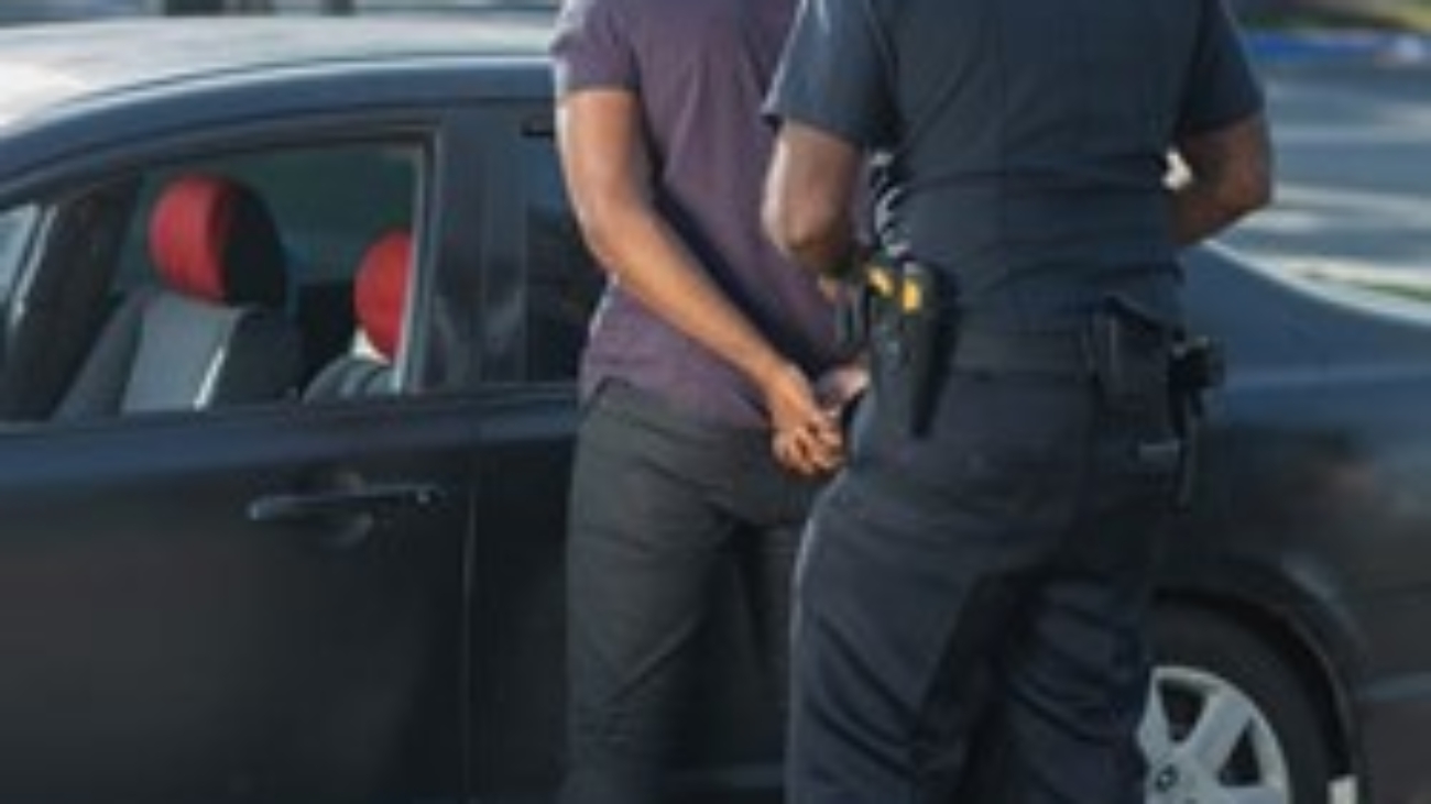 A man getting arrested.