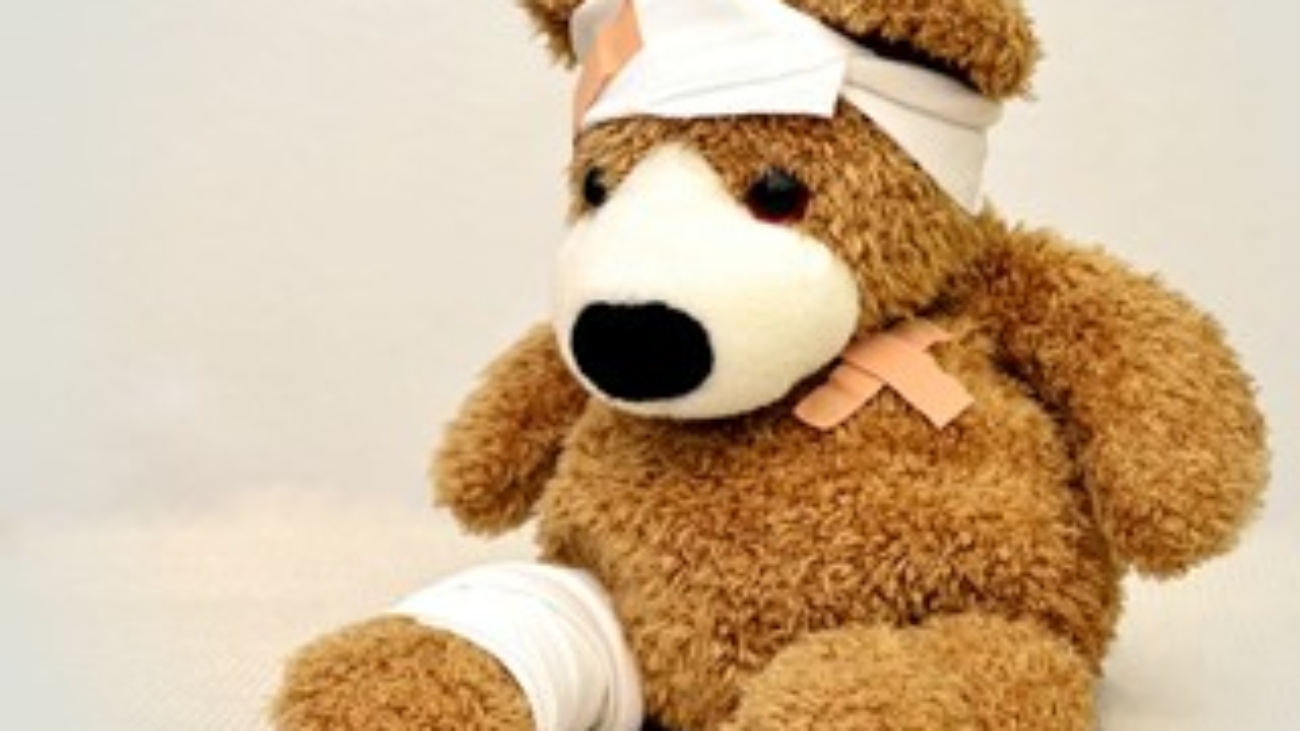 A teddy bear with injuries